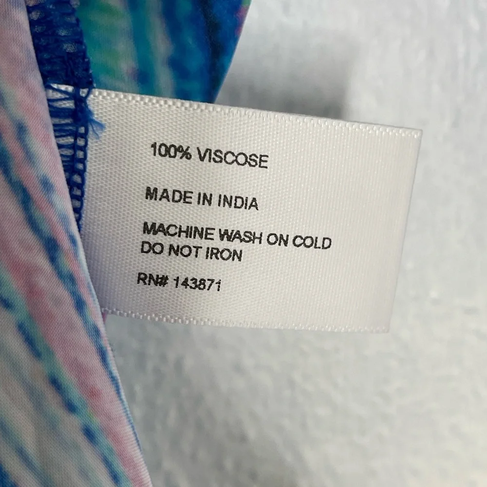 Frankie’s Bikinis Fifi Sustainable blue purple swirl cover up shirt. Size XS